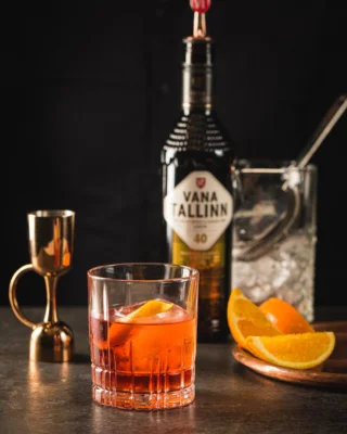 Discover the Vana Tallinn Negroni – a perfect harmony of flavors with a delightful, spicy twist!

2 cl Bombay Sapphire
2.5 cl Campari
0.5 cl Martini Rosso
1.5 cl Vana Tallinn 40%
glass: lowball glass

Combine all of the ingredients in a glass filled with ice and stir. Run the flamed orange peel around the edge of the glass, lightly squeezing to express the oils. Drop the peel into the glass and enjoy.

Attention, this is an alcoholic beverage. Alcohol may damage your health

#vanatallinn #vanatallinnliqueur #vanatallinncocktails #negroni