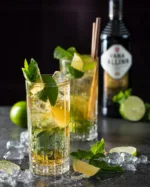 It's Mojito season 🍋‍🟩🍋‍🟩🍋‍🟩

The Vana Tallinn Mojito brings together cool mint, bright citrus, and the velvety warmth of our signature liqueur—crafted from Jamaican rum and exotic spices. 🌿🍋

4 cl Vana Tallinn
1 ts brown sugar
½ lime
8 fresh mint leaves
Carbonated water
Crushed ice

Put lime sectors, peppermint leaves, brown sugar and a bit of crushed ice in the glass. Crush lime slices and peppermint with a muddler. Then fill the glass with crushed ice and pour Vana Tallinn on top. Mix with a spoon, fill the glass with carbonated water. Serve with two drinking straws.

Attention! This is an alcoholic beverage. Alcohol may damage your health!